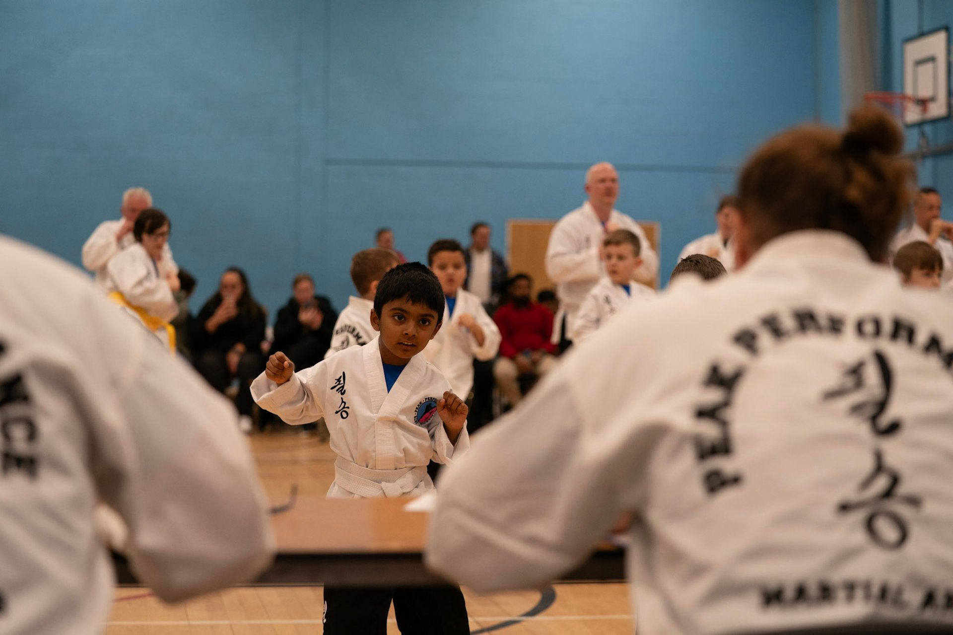woman wearing yellow long-sleeved dress under white clouds and blue sky during daytime