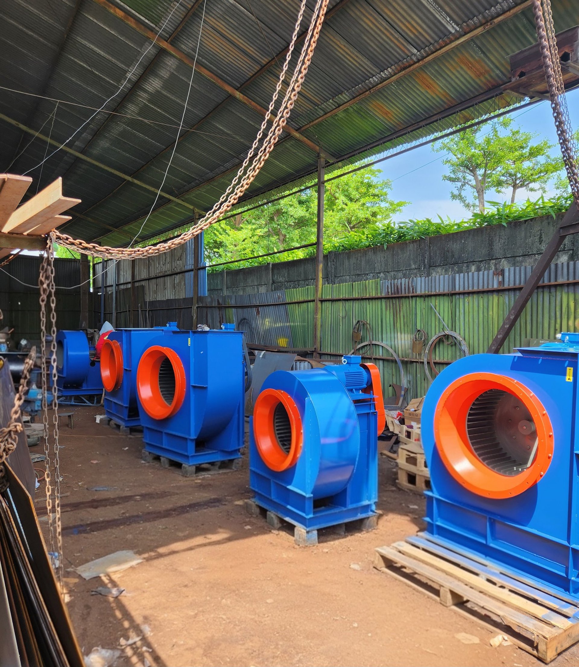 an abstract photo of a curved building with a blue sky in the background