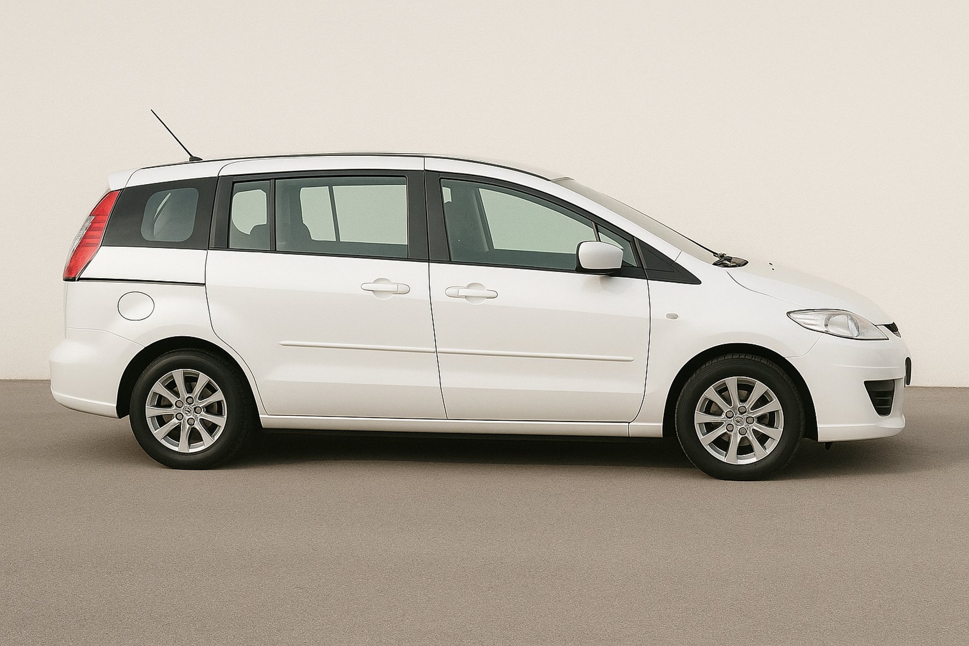 an abstract photo of a curved building with a blue sky in the background