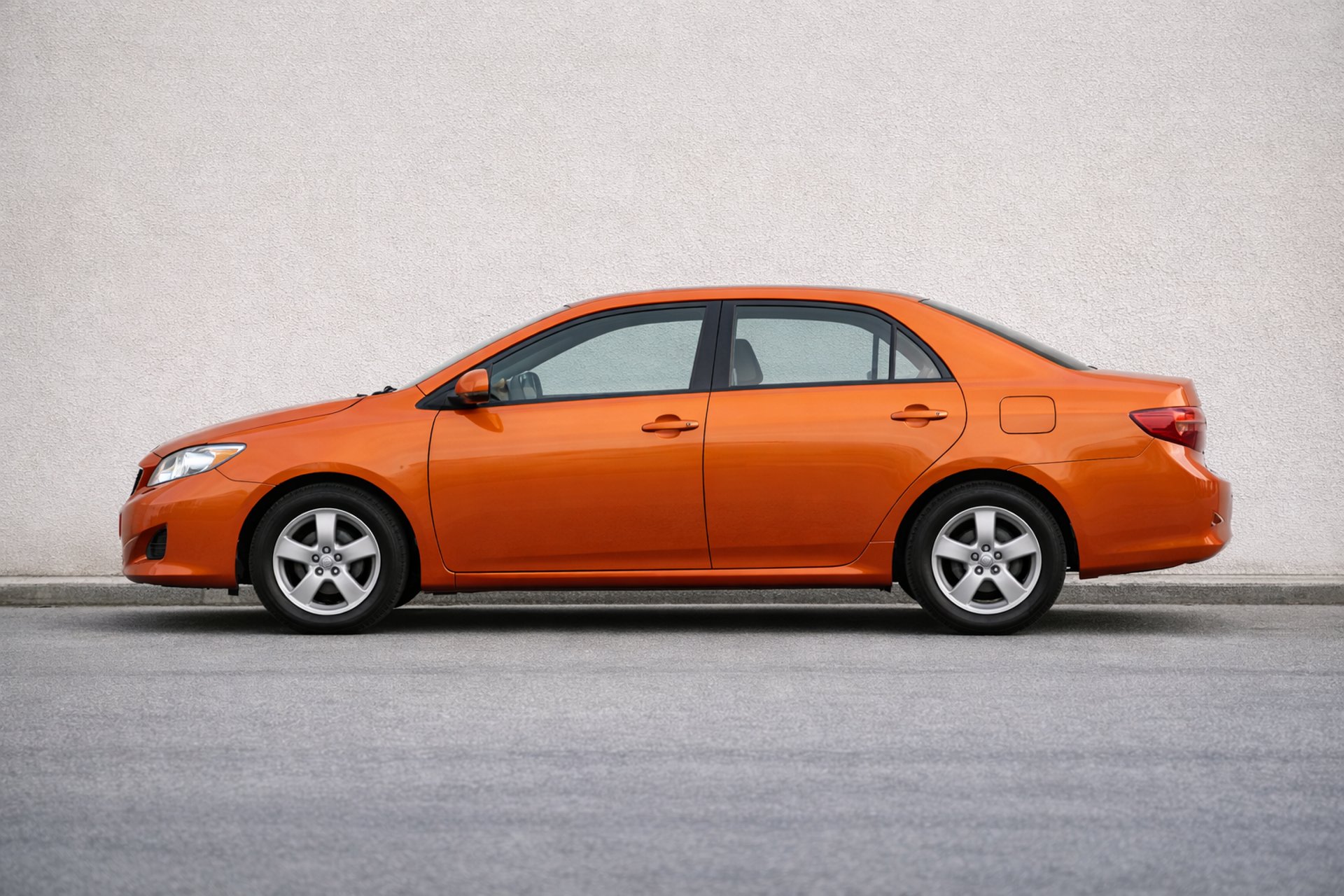 an abstract photo of a curved building with a blue sky in the background