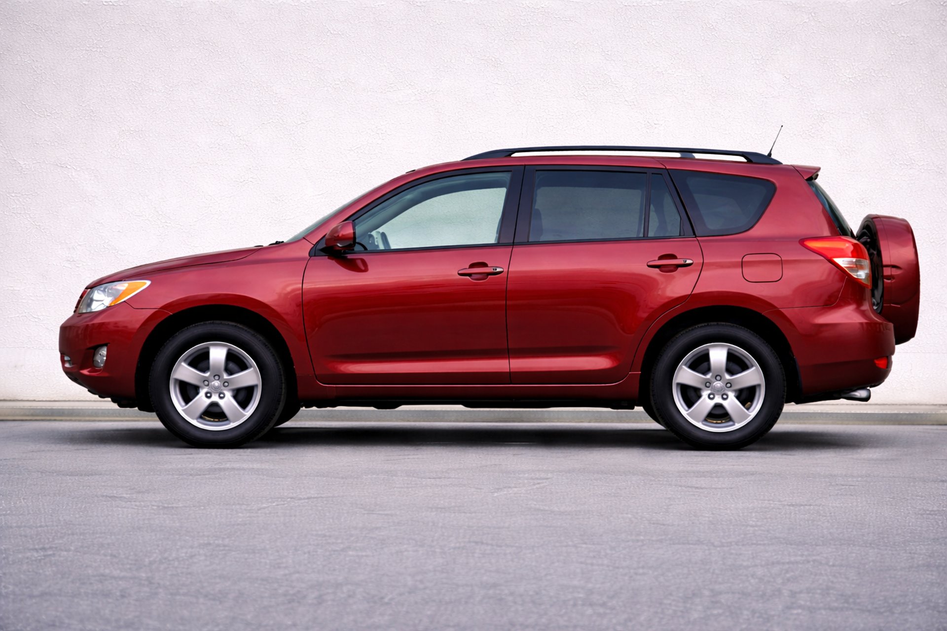 an abstract photo of a curved building with a blue sky in the background