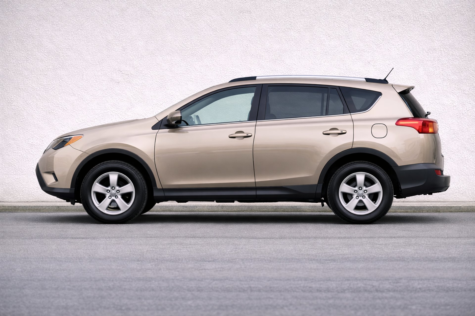 an abstract photo of a curved building with a blue sky in the background