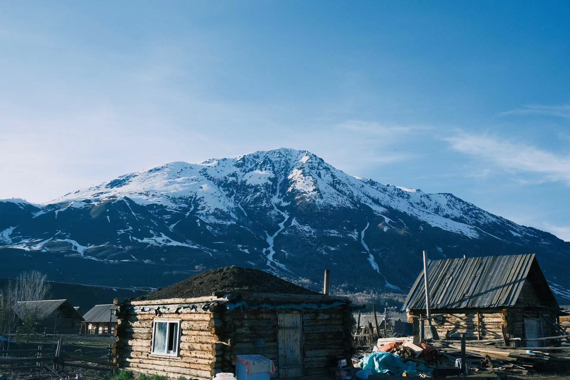 person wearing grey knit sweater