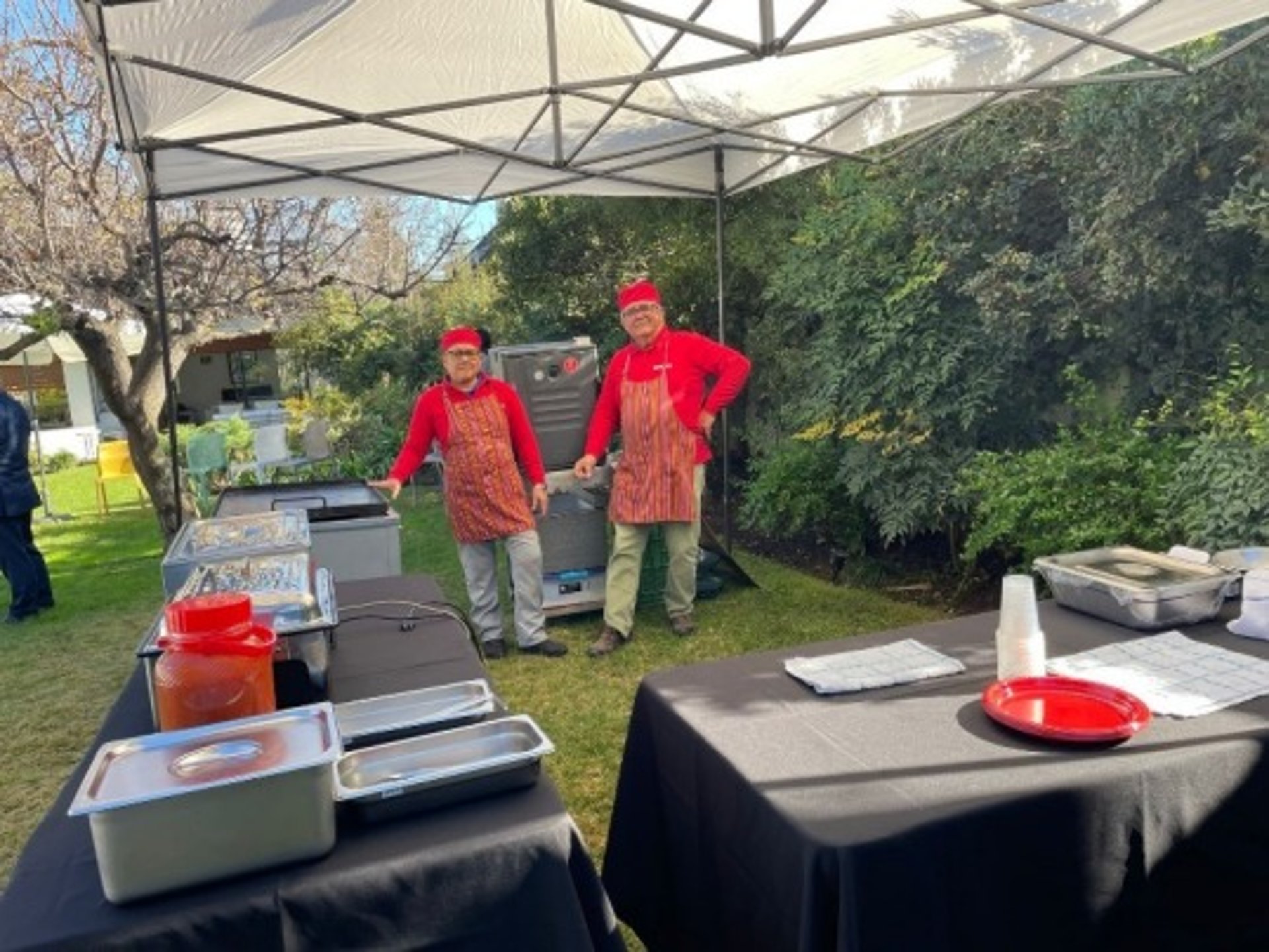 an abstract photo of a curved building with a blue sky in the background