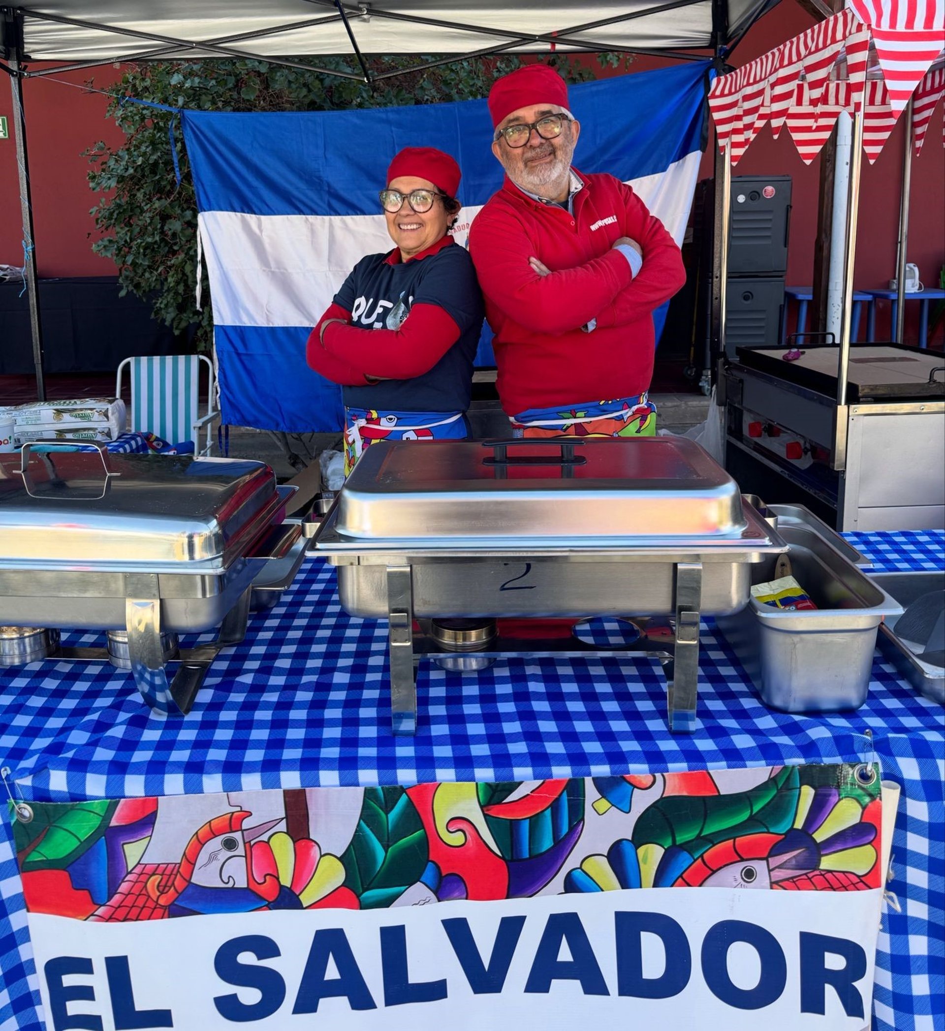 an abstract photo of a curved building with a blue sky in the background
