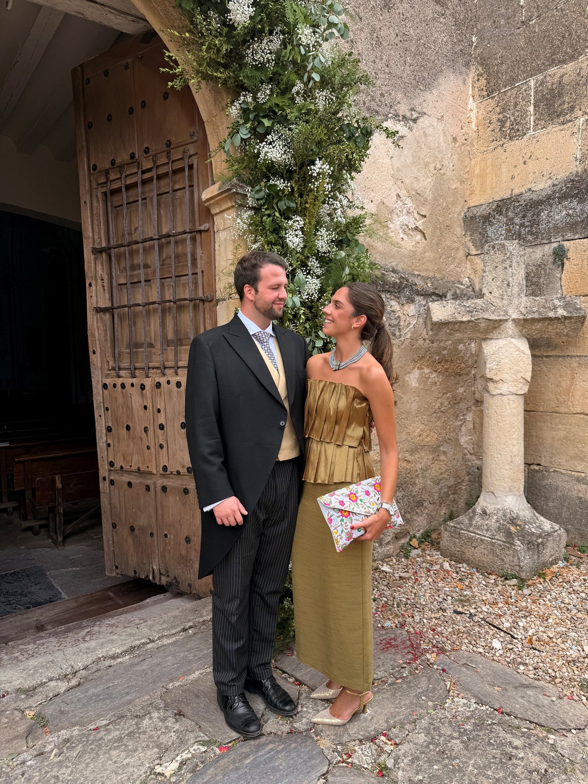 couple wearing silver-colored rings
