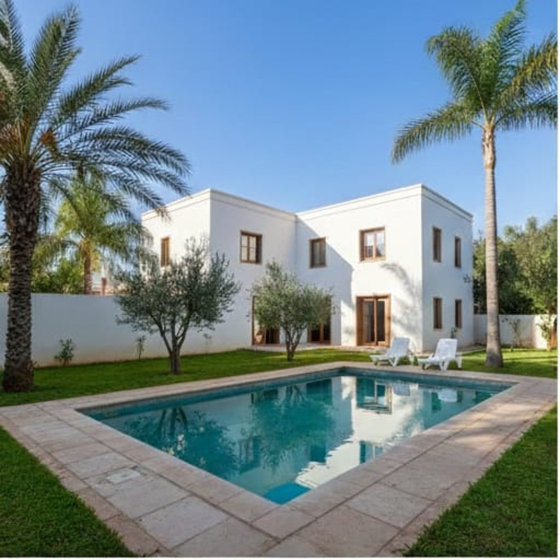 black and brown leather padded tub sofa
