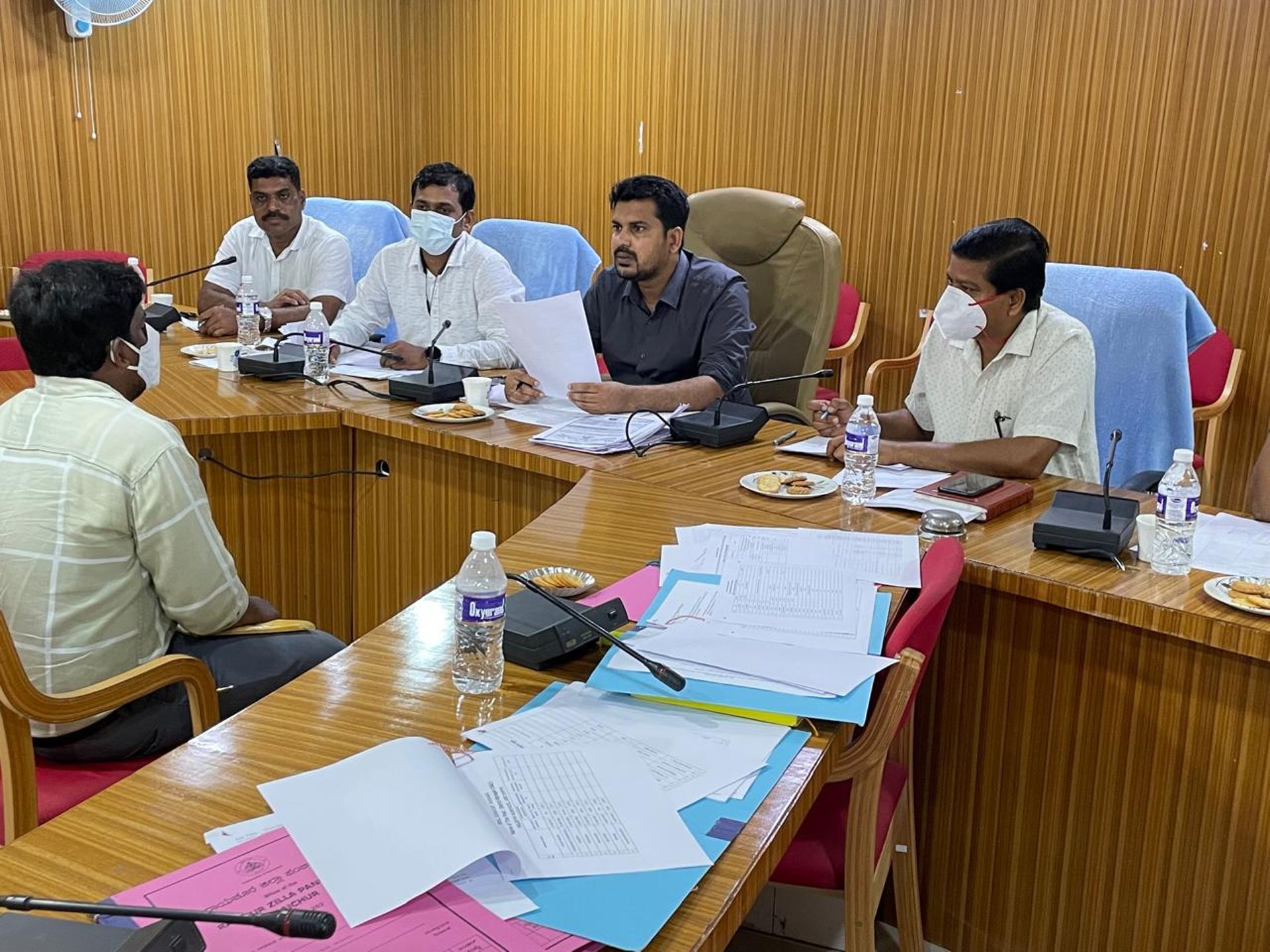 black and brown leather padded tub sofa