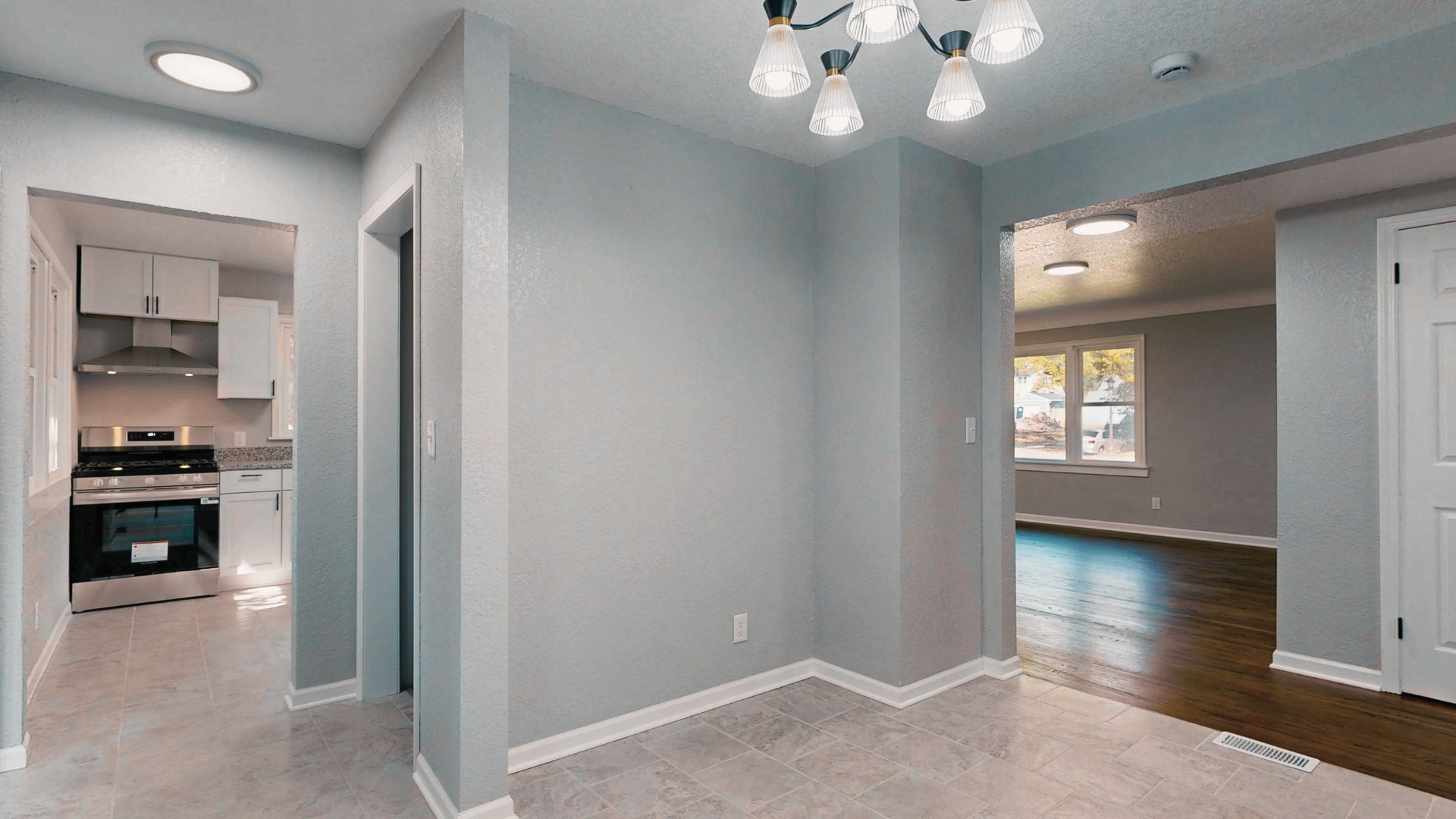 an abstract photo of a curved building with a blue sky in the background