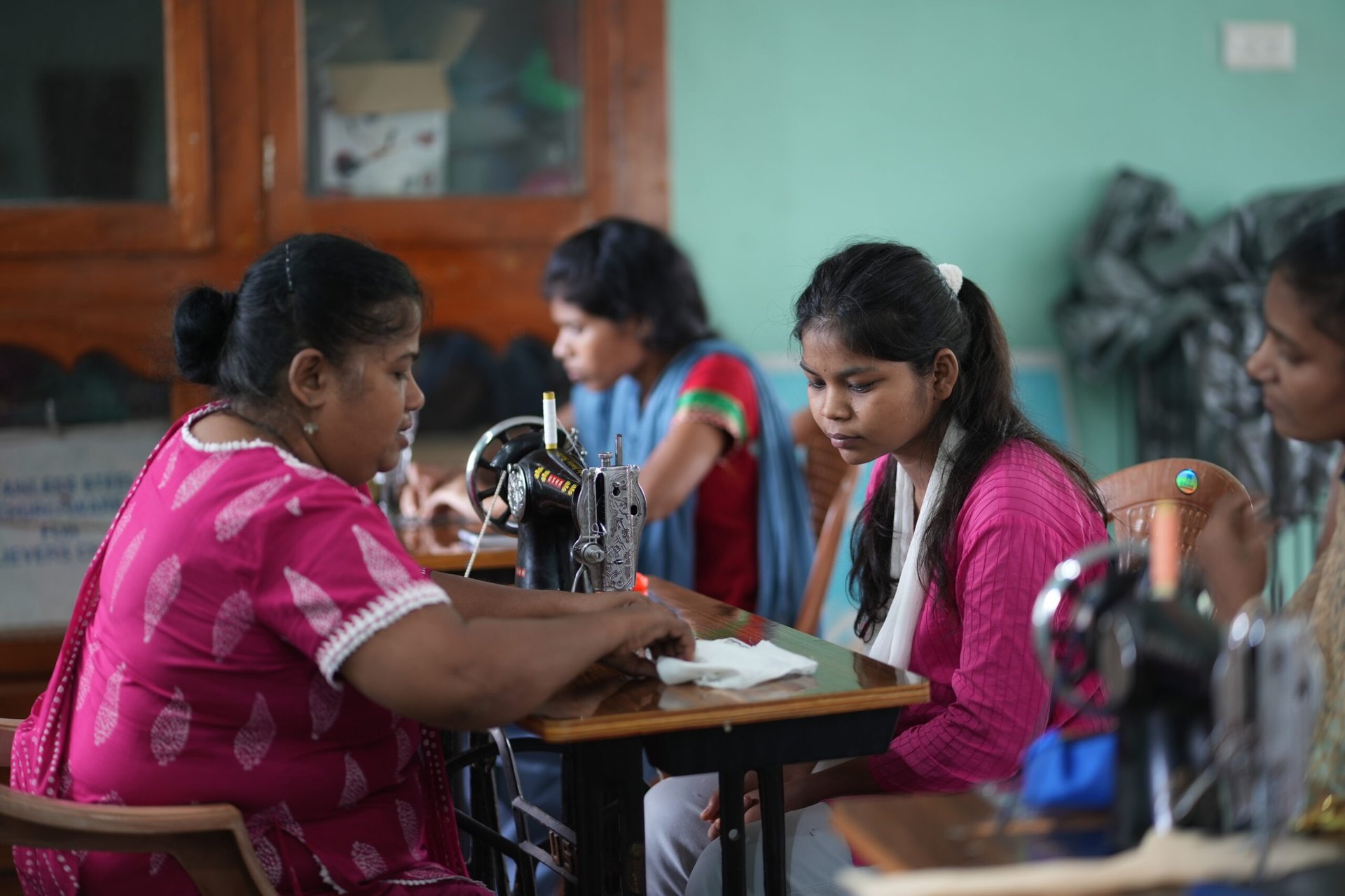 a man riding a wave on top of a surfboard