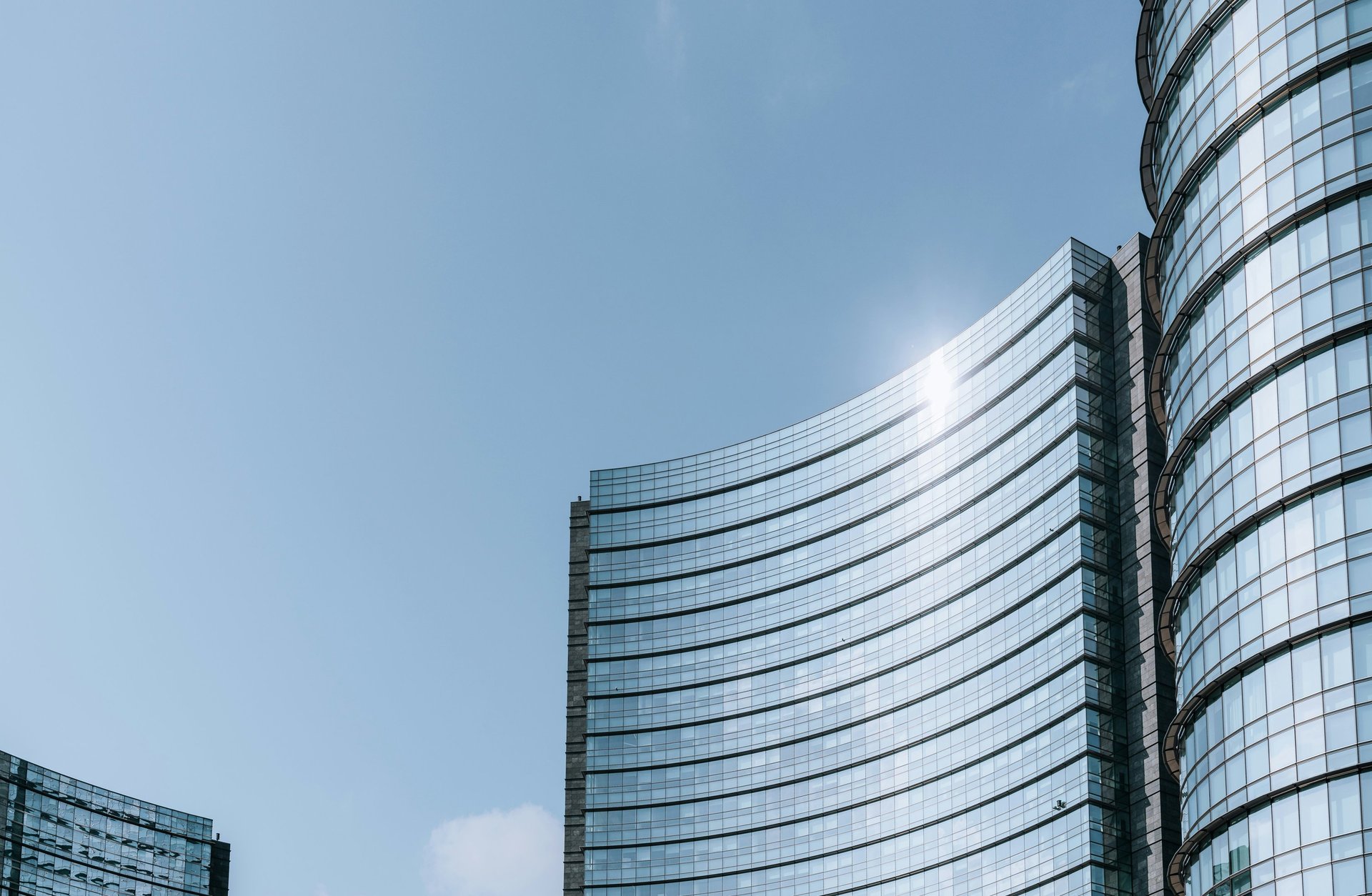 four white painted buildings
