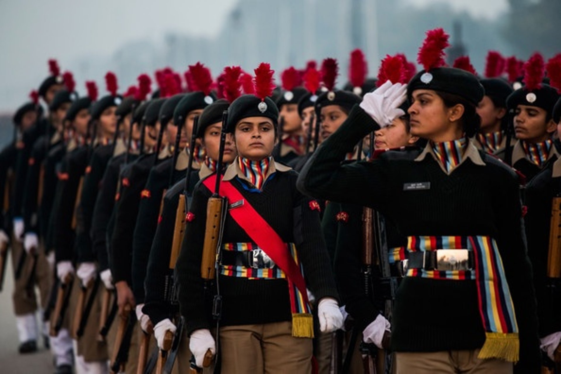 person wearing grey knit sweater