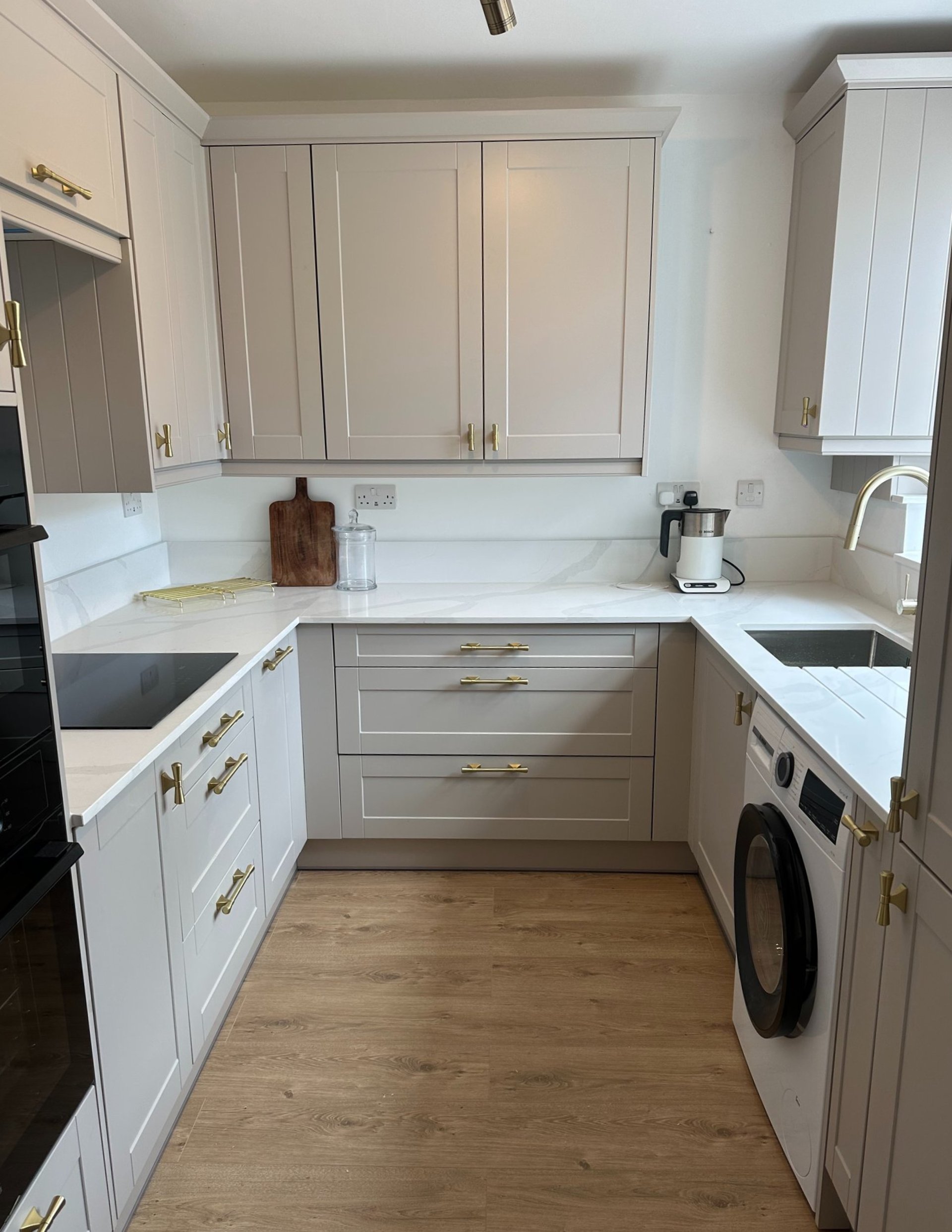 black and brown leather padded tub sofa