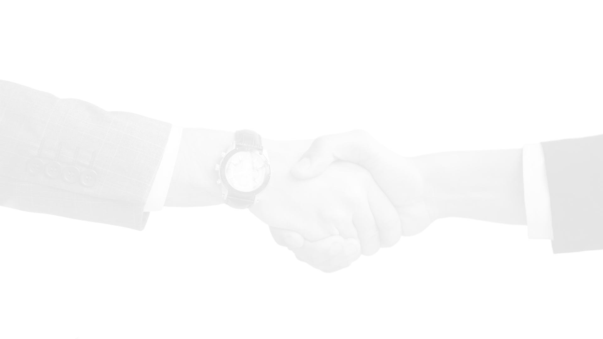 two person shaking hands near white painted wall