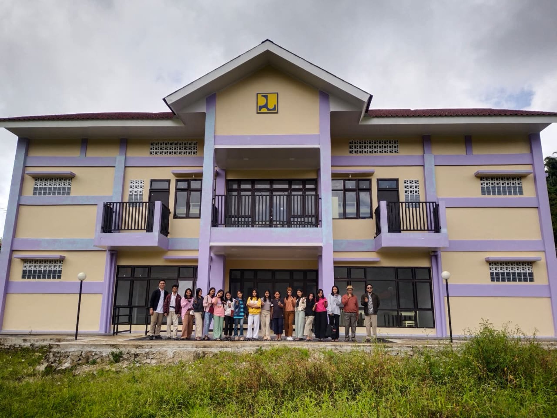 woman wearing yellow long-sleeved dress under white clouds and blue sky during daytime