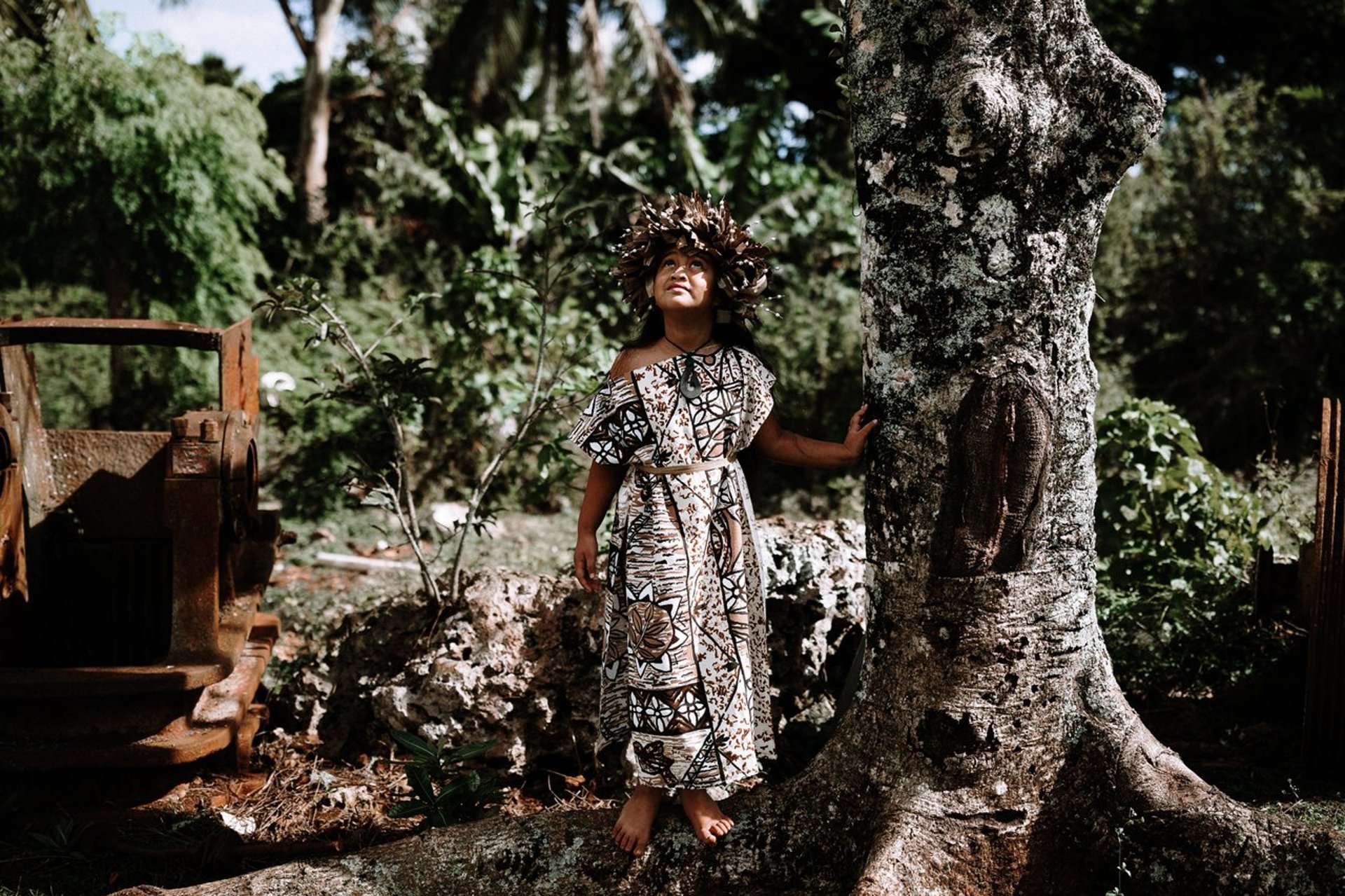 an abstract photo of a curved building with a blue sky in the background