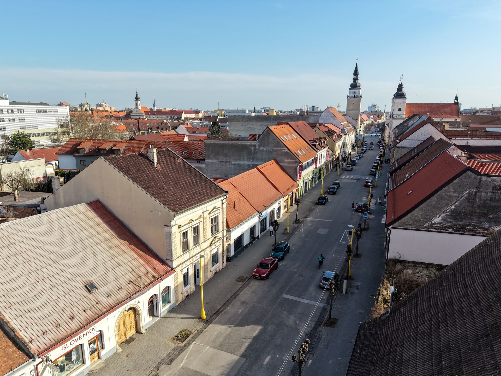 black and brown leather padded tub sofa