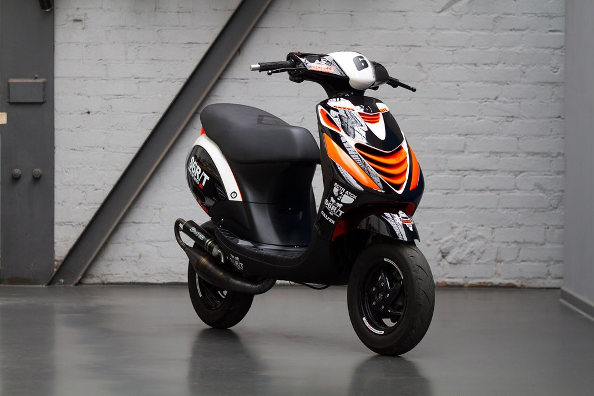 person wearing grey knit sweater