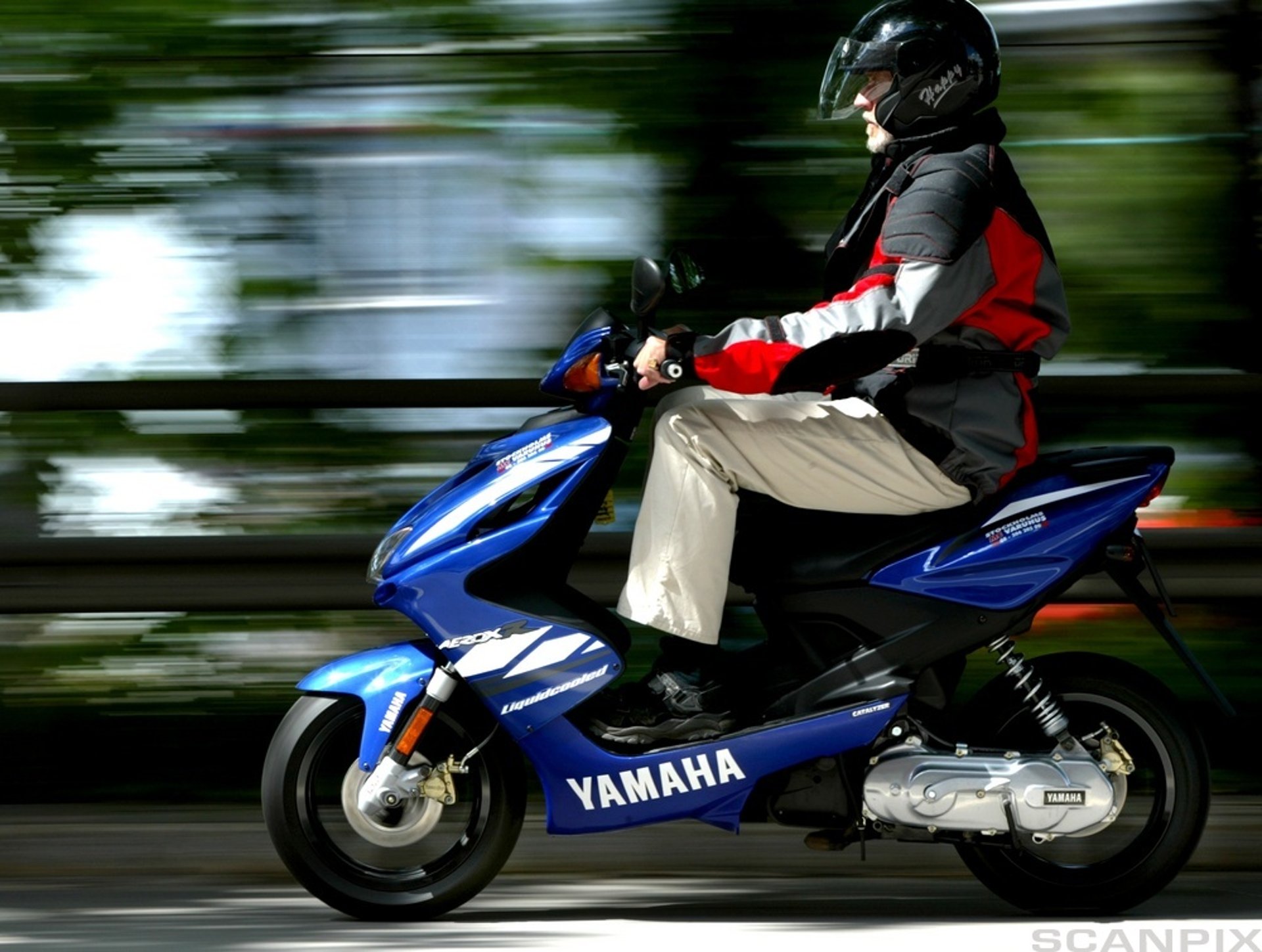 person wearing grey knit sweater