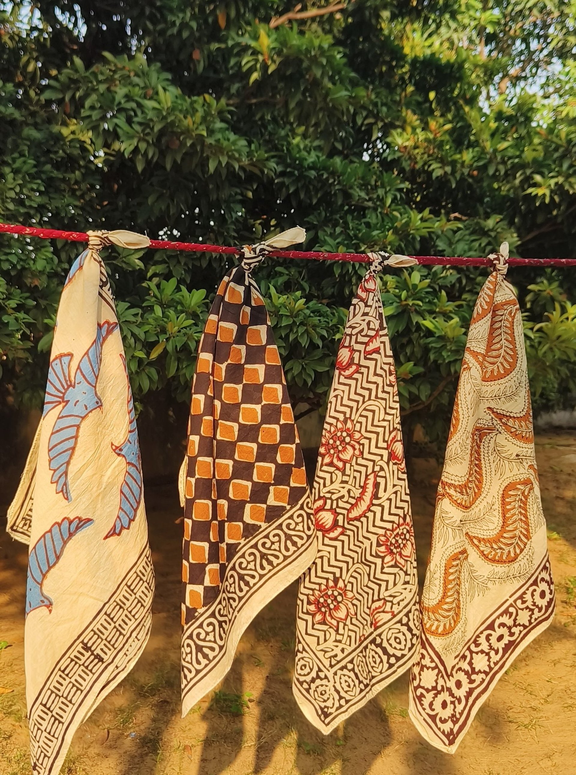 woman wearing yellow long-sleeved dress under white clouds and blue sky during daytime