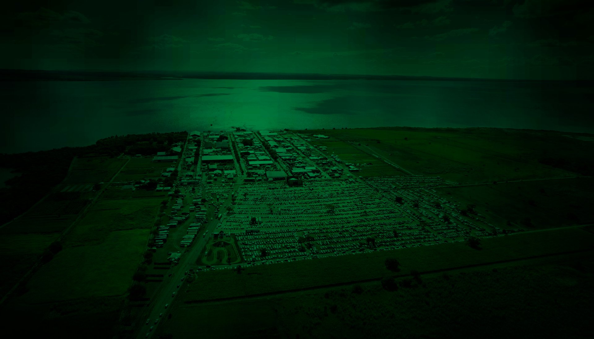 an abstract photo of a curved building with a blue sky in the background