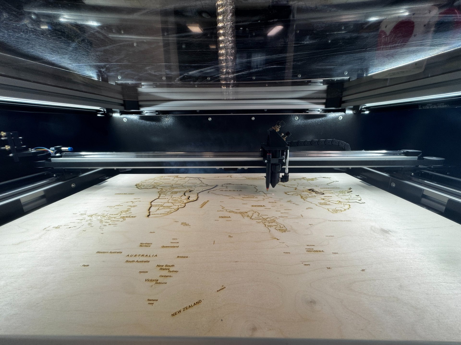 a bunch of billboards that are on the side of a building