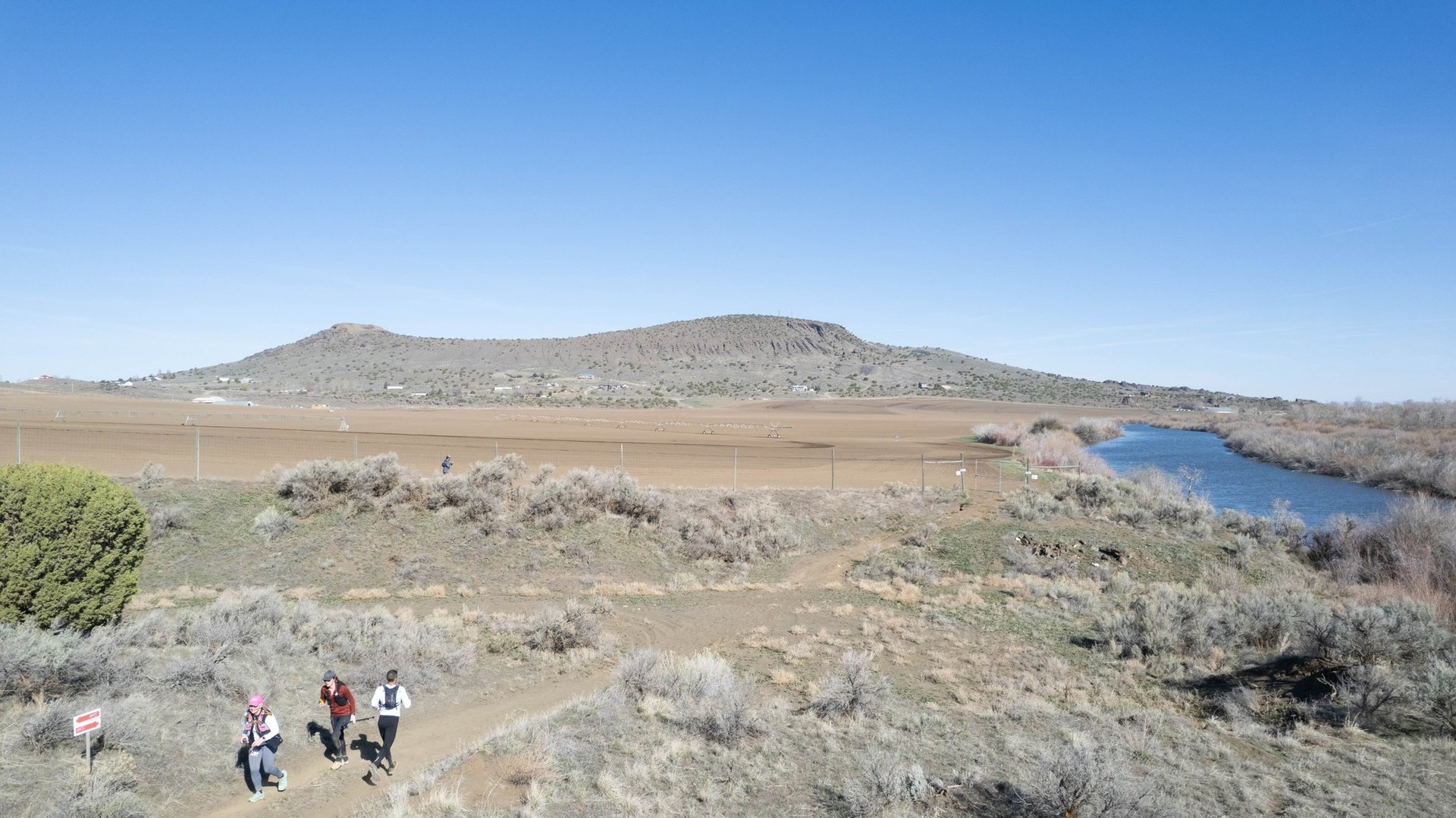 North Menan Butte Shot of the course and runners during race day, scenic view of Snake river