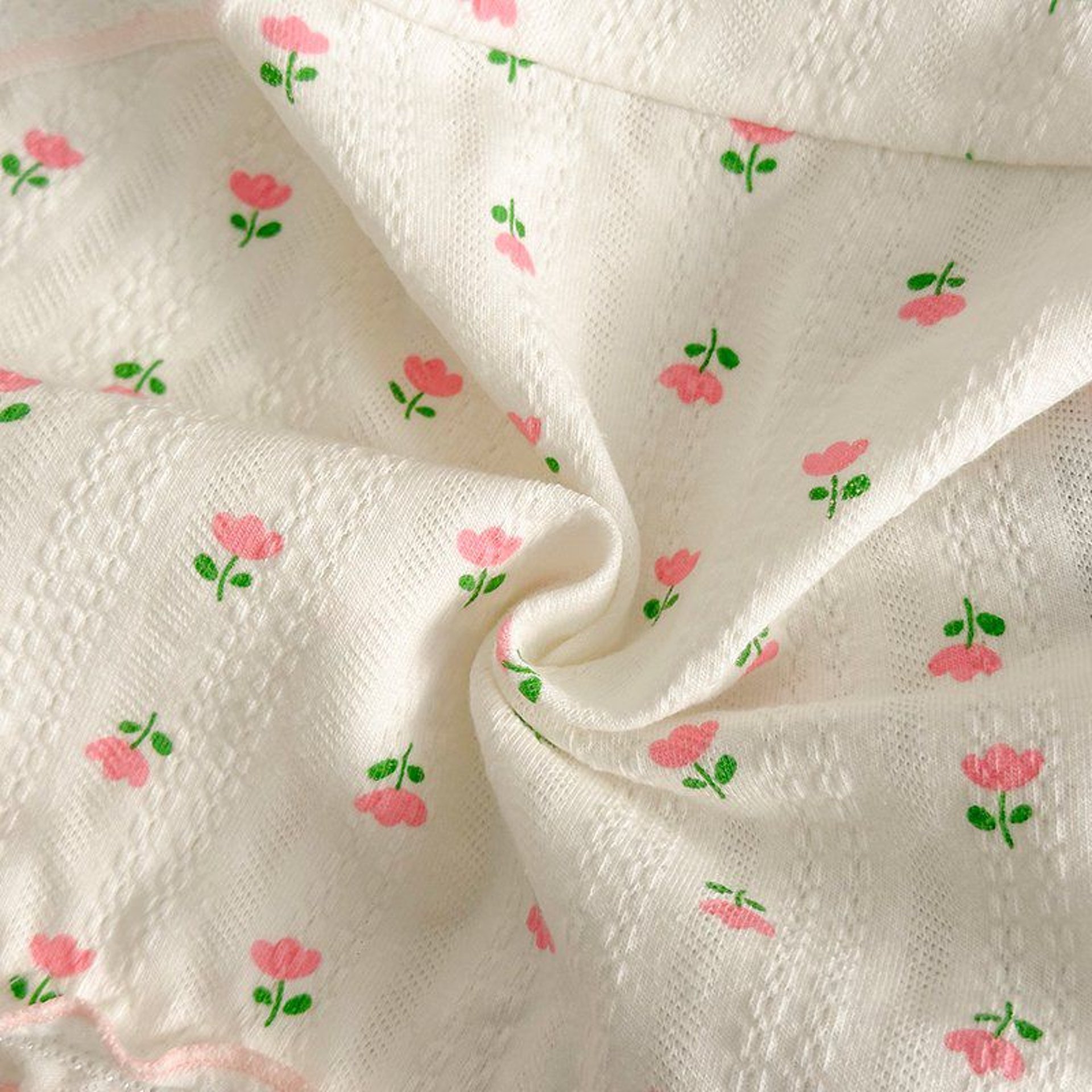 an abstract photo of a curved building with a blue sky in the background