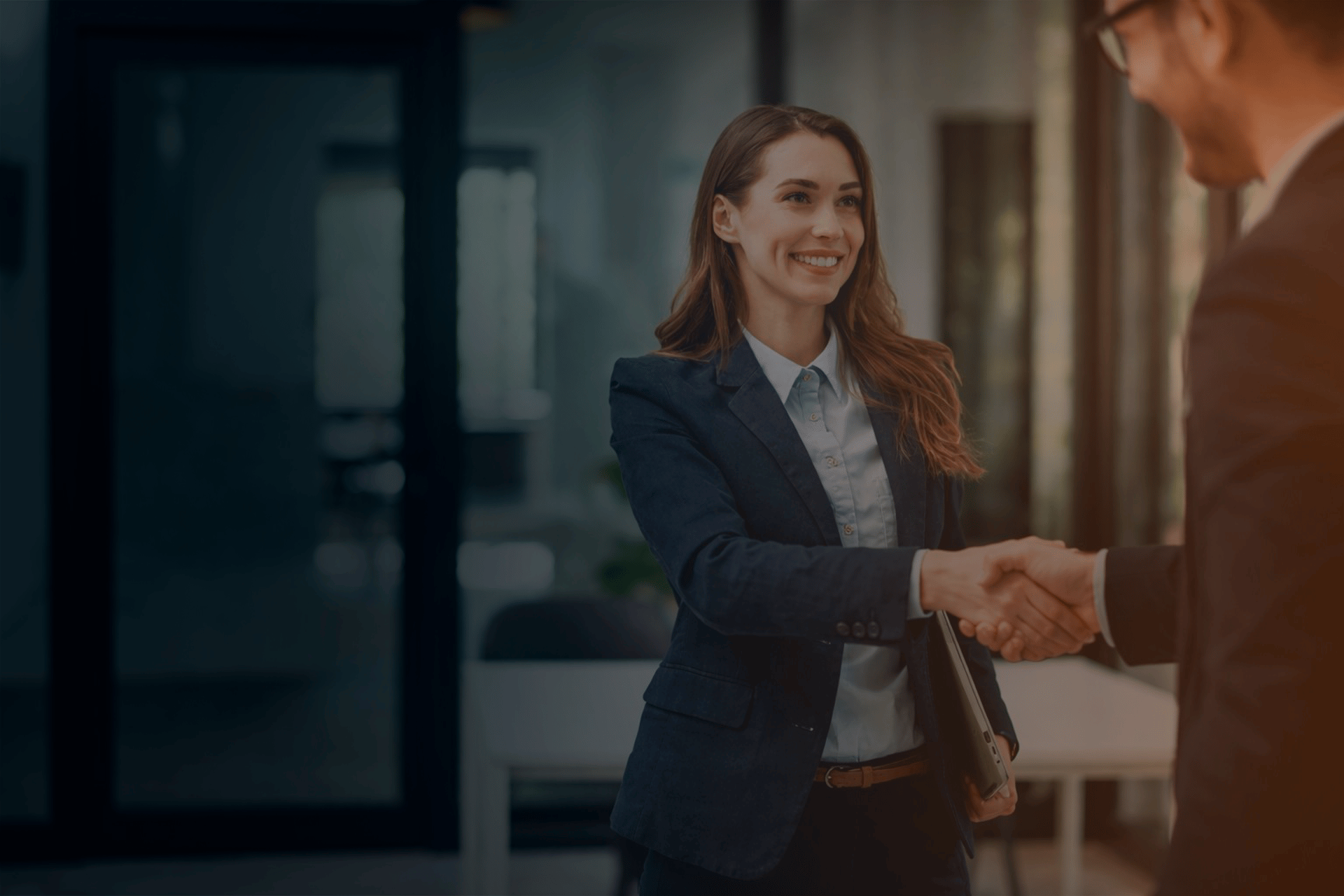 an abstract photo of a curved building with a blue sky in the background