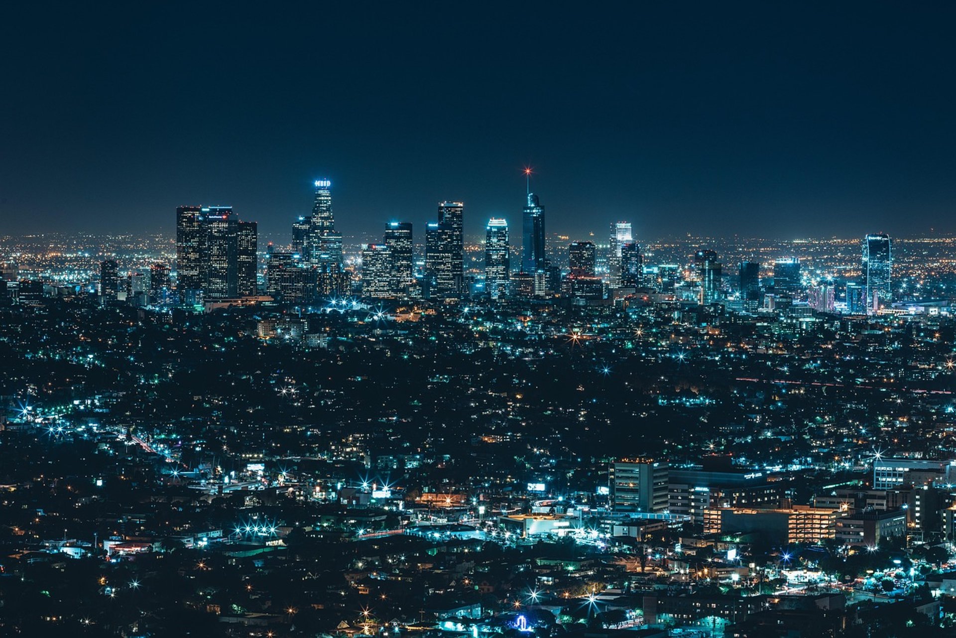 aerial photography of city skyline during night time