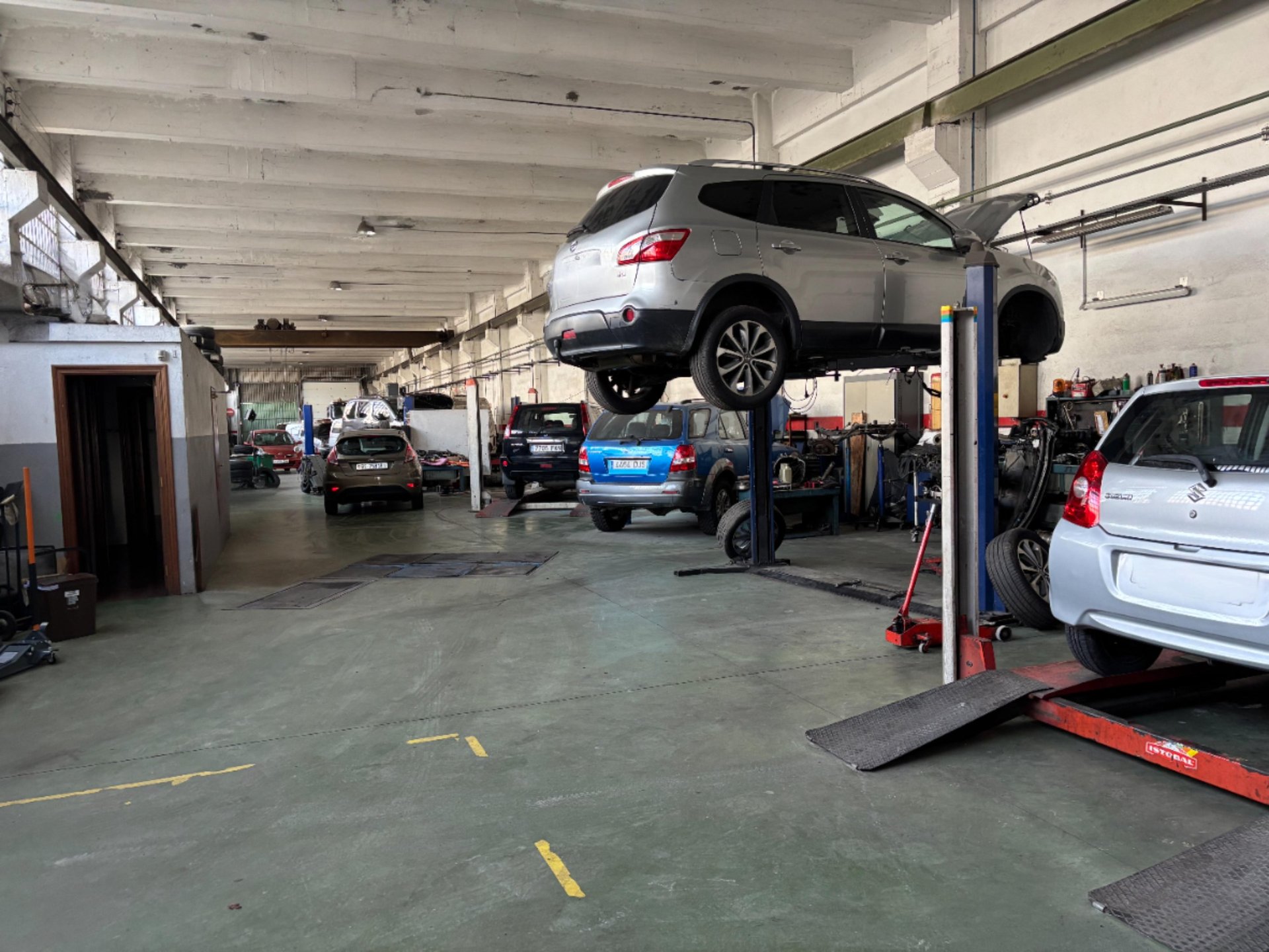 black and brown leather padded tub sofa