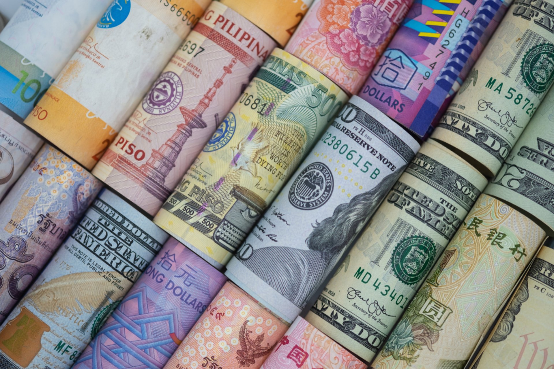 a pile of money sitting on top of a table