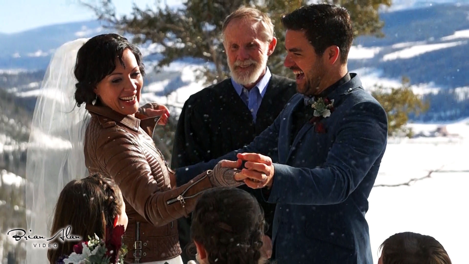 couple wearing silver-colored rings