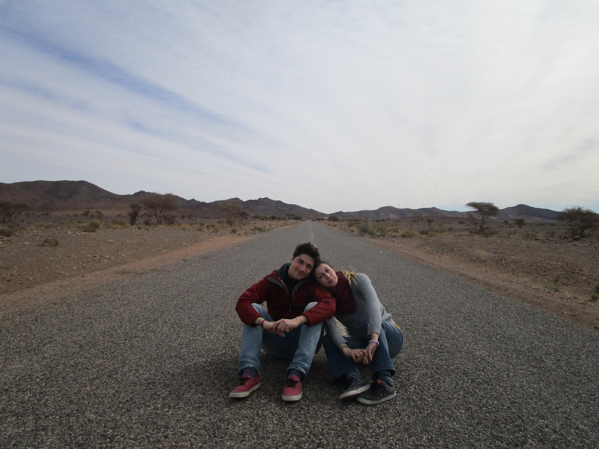 couple wearing silver-colored rings