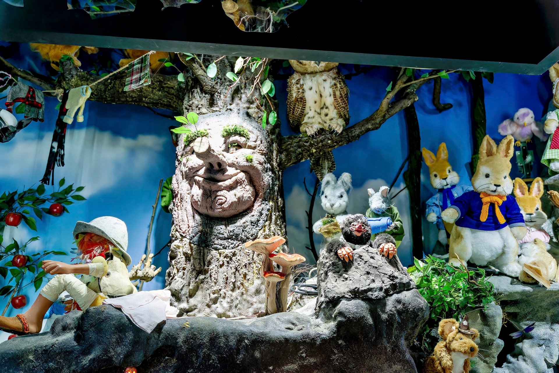 woman wearing yellow long-sleeved dress under white clouds and blue sky during daytime