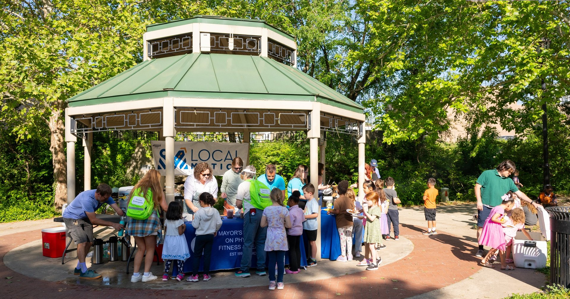 an abstract photo of a curved building with a blue sky in the background