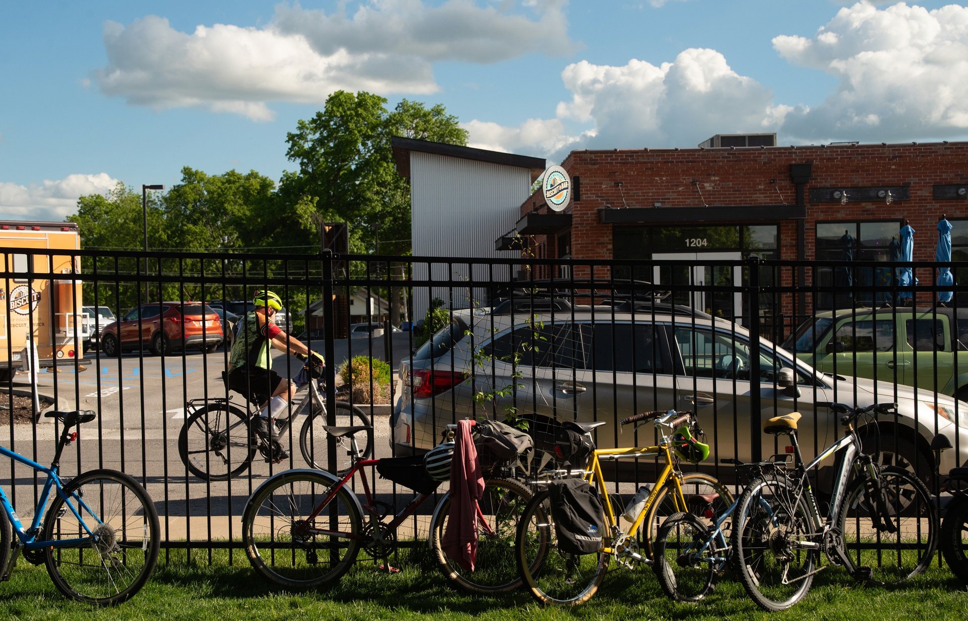 an abstract photo of a curved building with a blue sky in the background