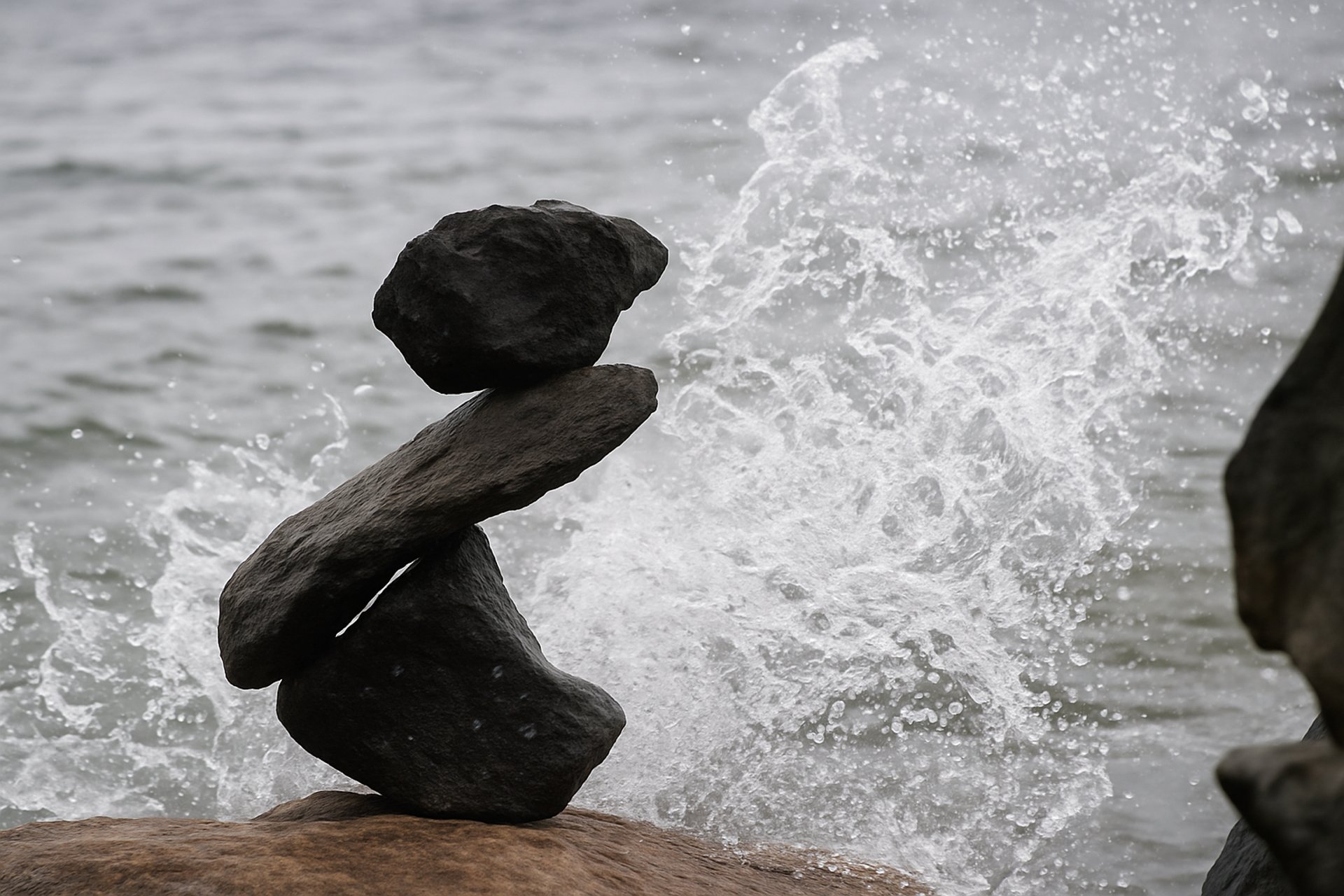 an abstract photo of a curved building with a blue sky in the background
