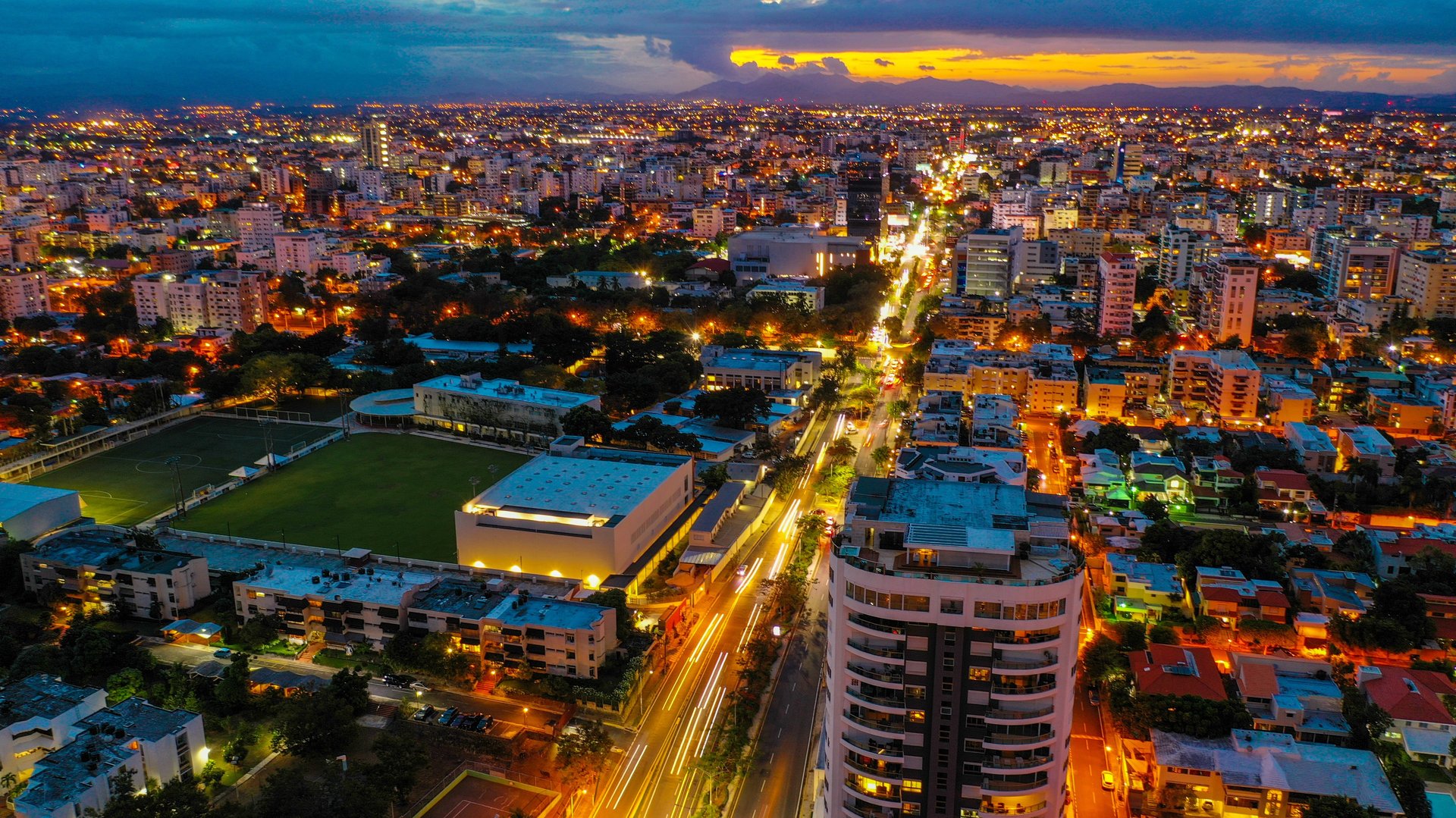 Santo Domingo city view at sunset with lights, buildings, and skyline in the Dominican Republic