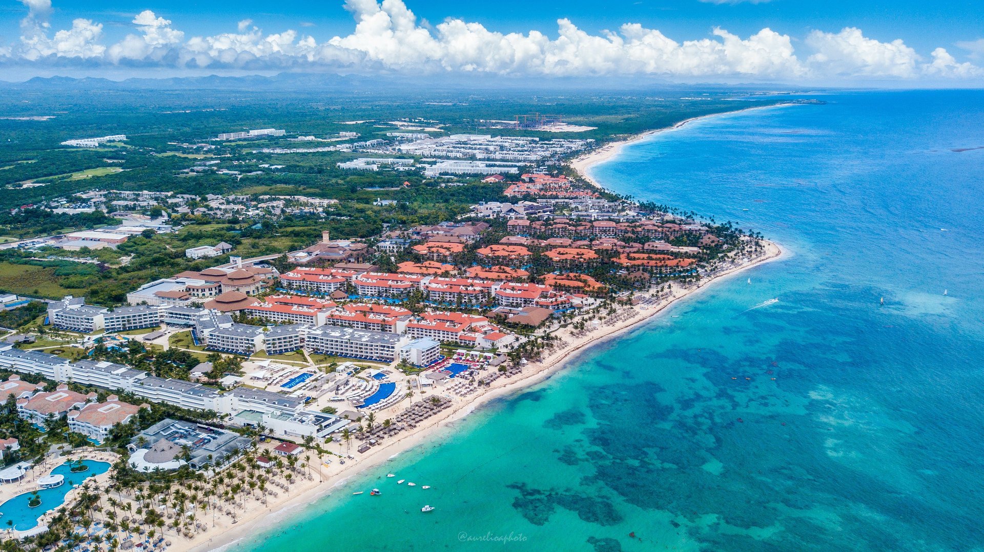 Aerial view of Bávaro beach resorts and turquoise sea in Punta Cana, Dominican Republic