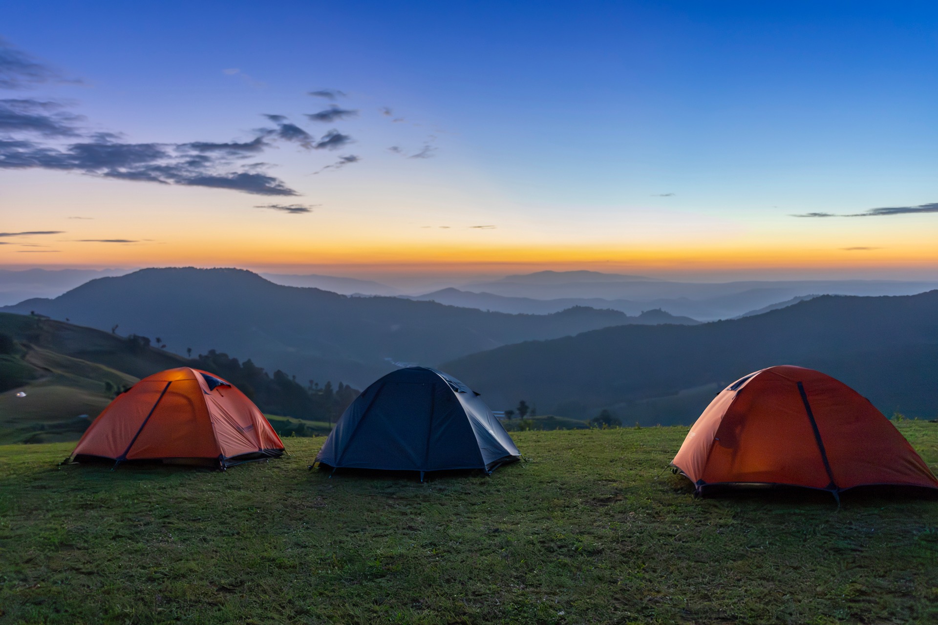 Mountain camping at sunrise in the Dominican Republic with scenic valley views
