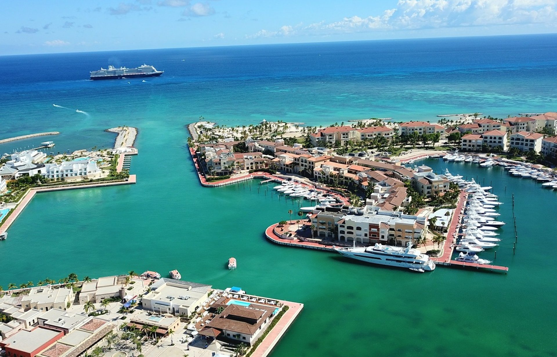 Luxury yachts and waterfront resorts at Marina Cap Cana, Dominican Republic