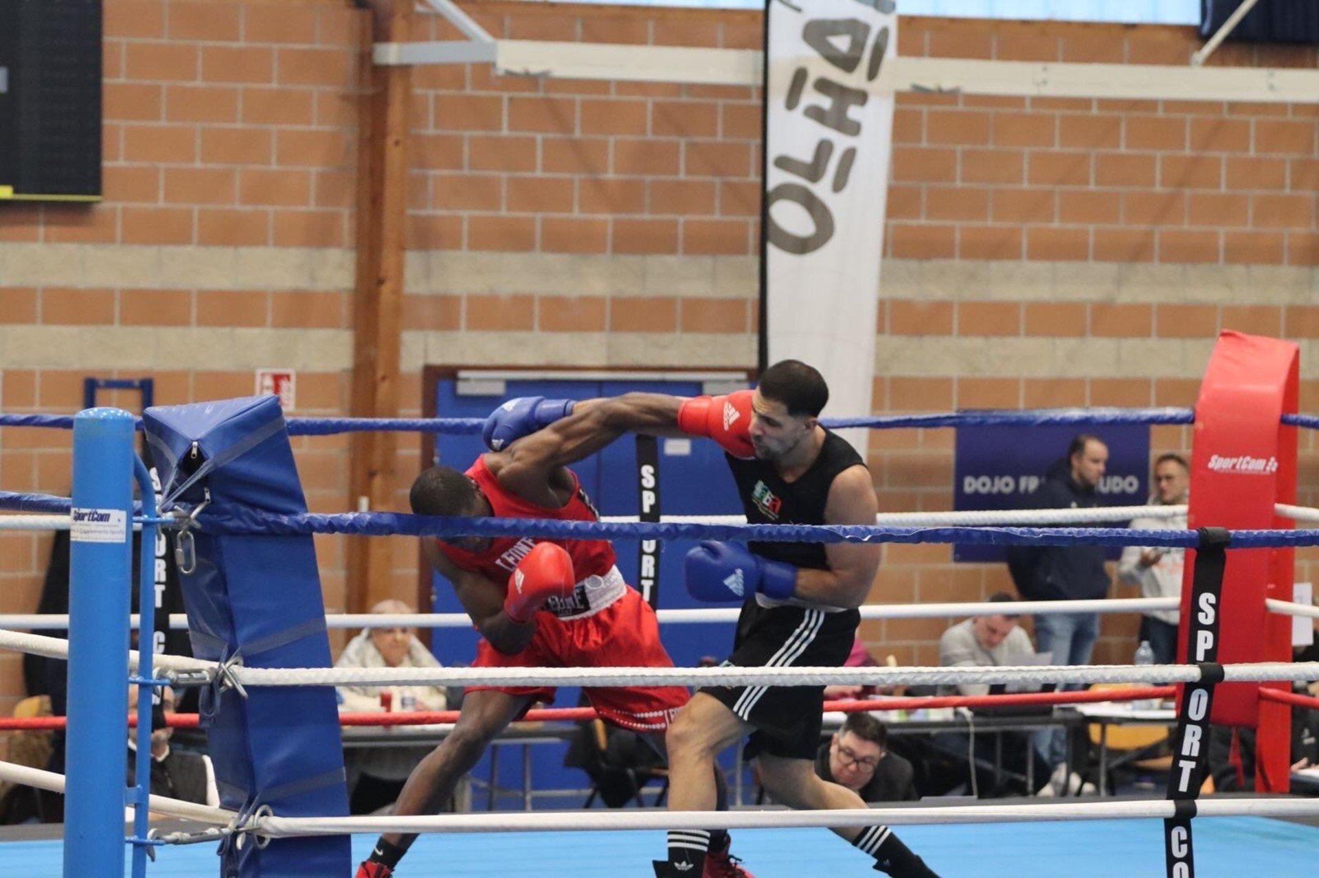 man standing and walking going on boxing ring surrounded with people