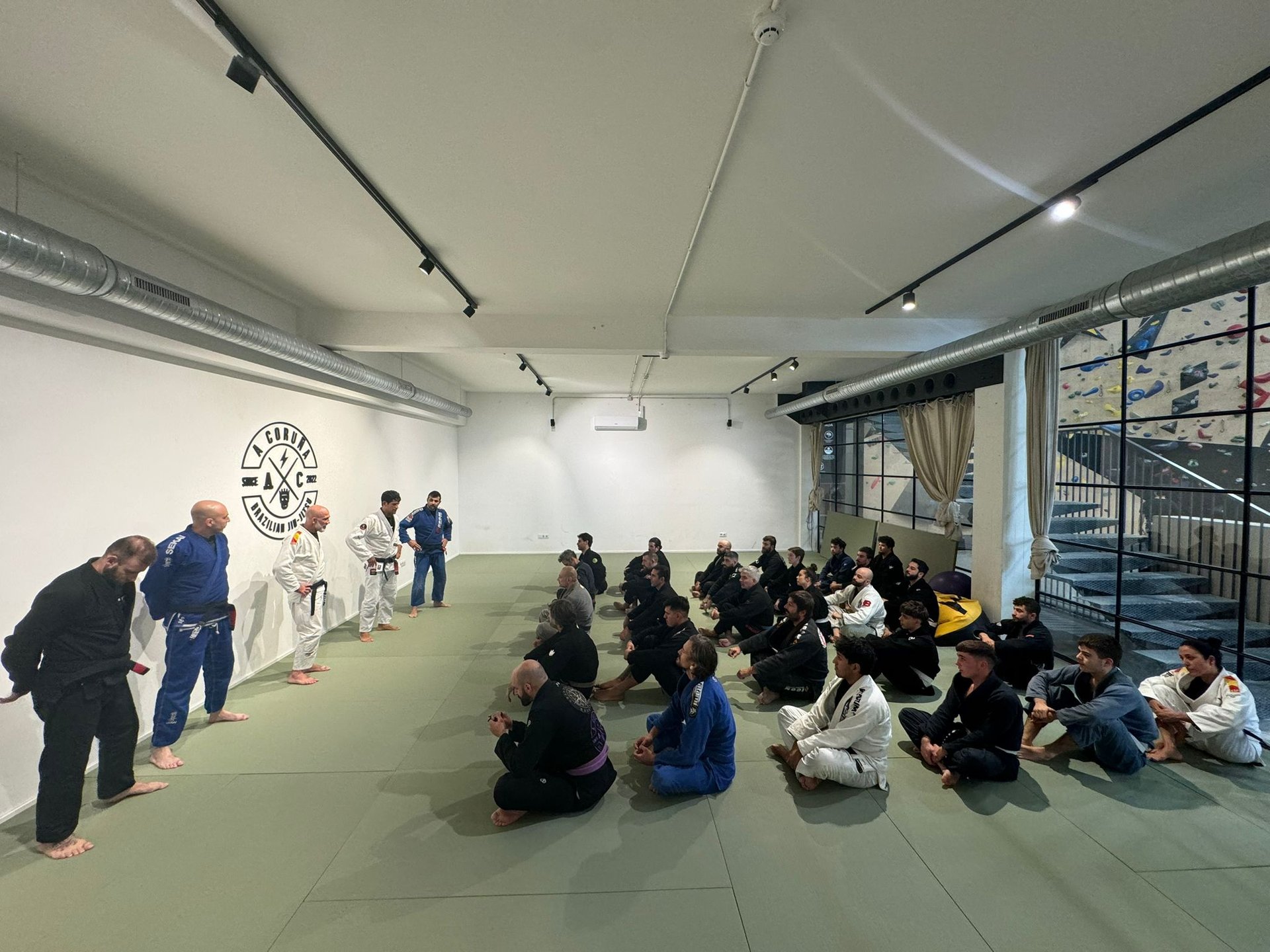 black and brown leather padded tub sofa