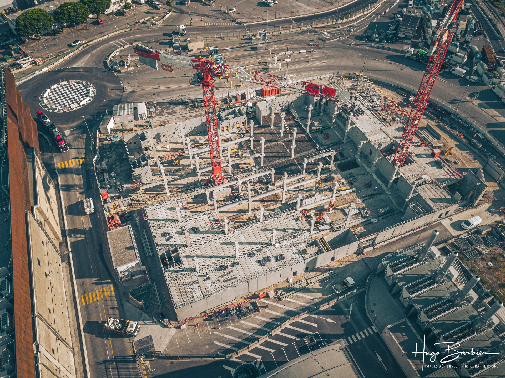 an abstract photo of a curved building with a blue sky in the background