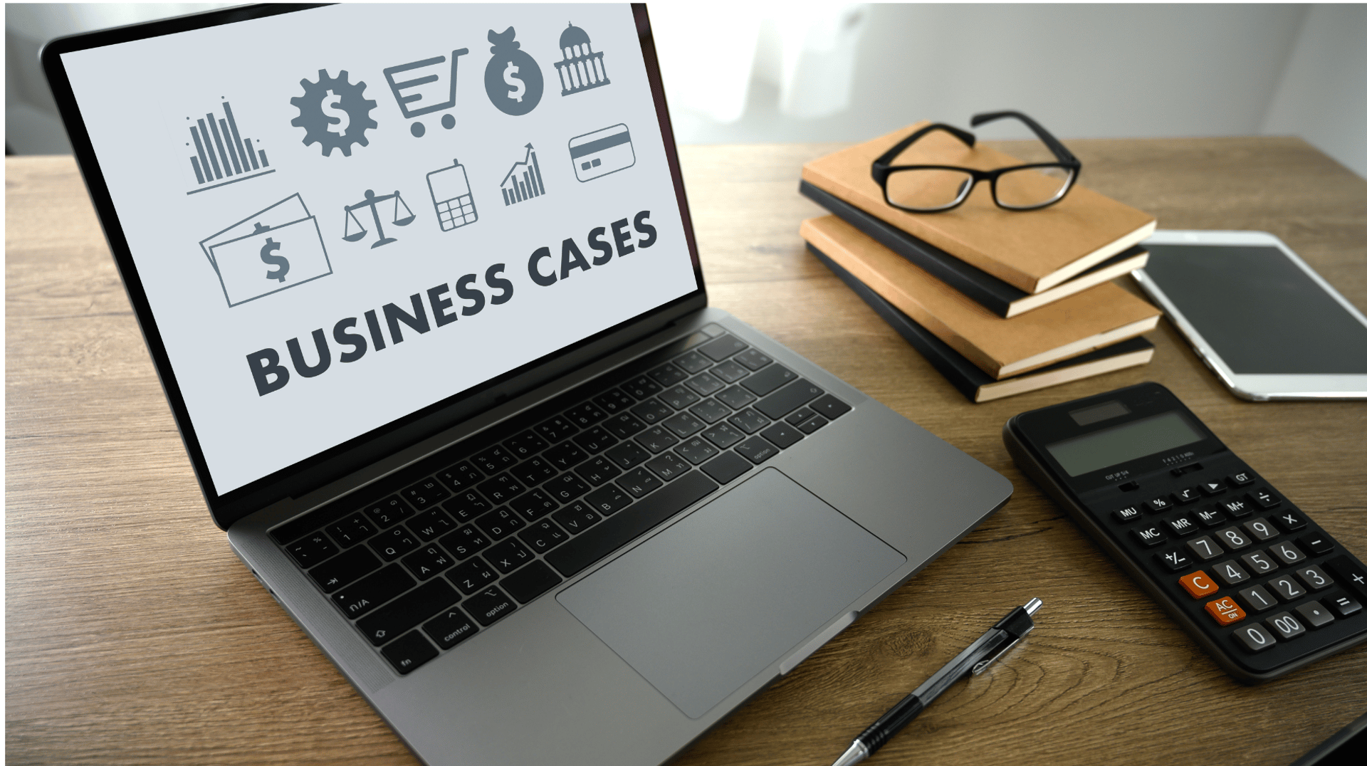 laptop with business cases phrase to reflect this a our successful case studies