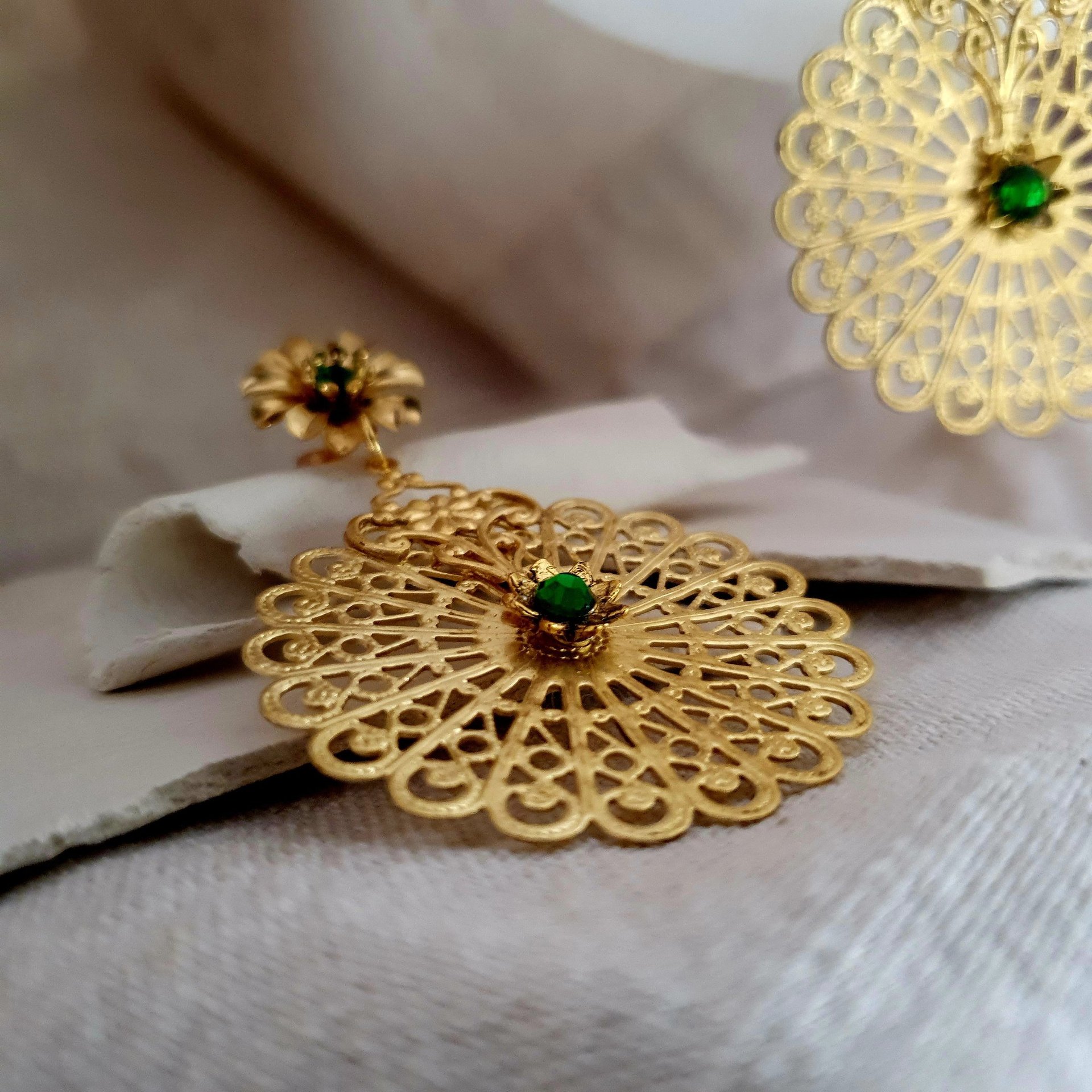 an abstract photo of a curved building with a blue sky in the background