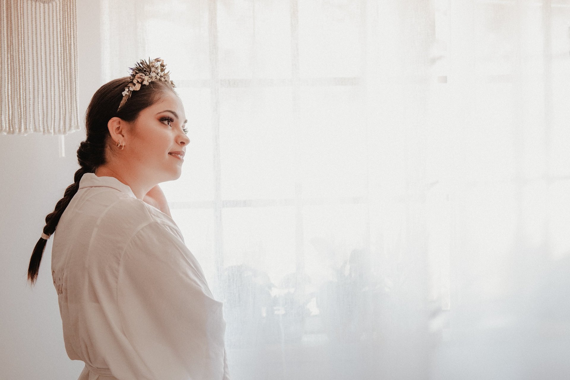 an abstract photo of a curved building with a blue sky in the background