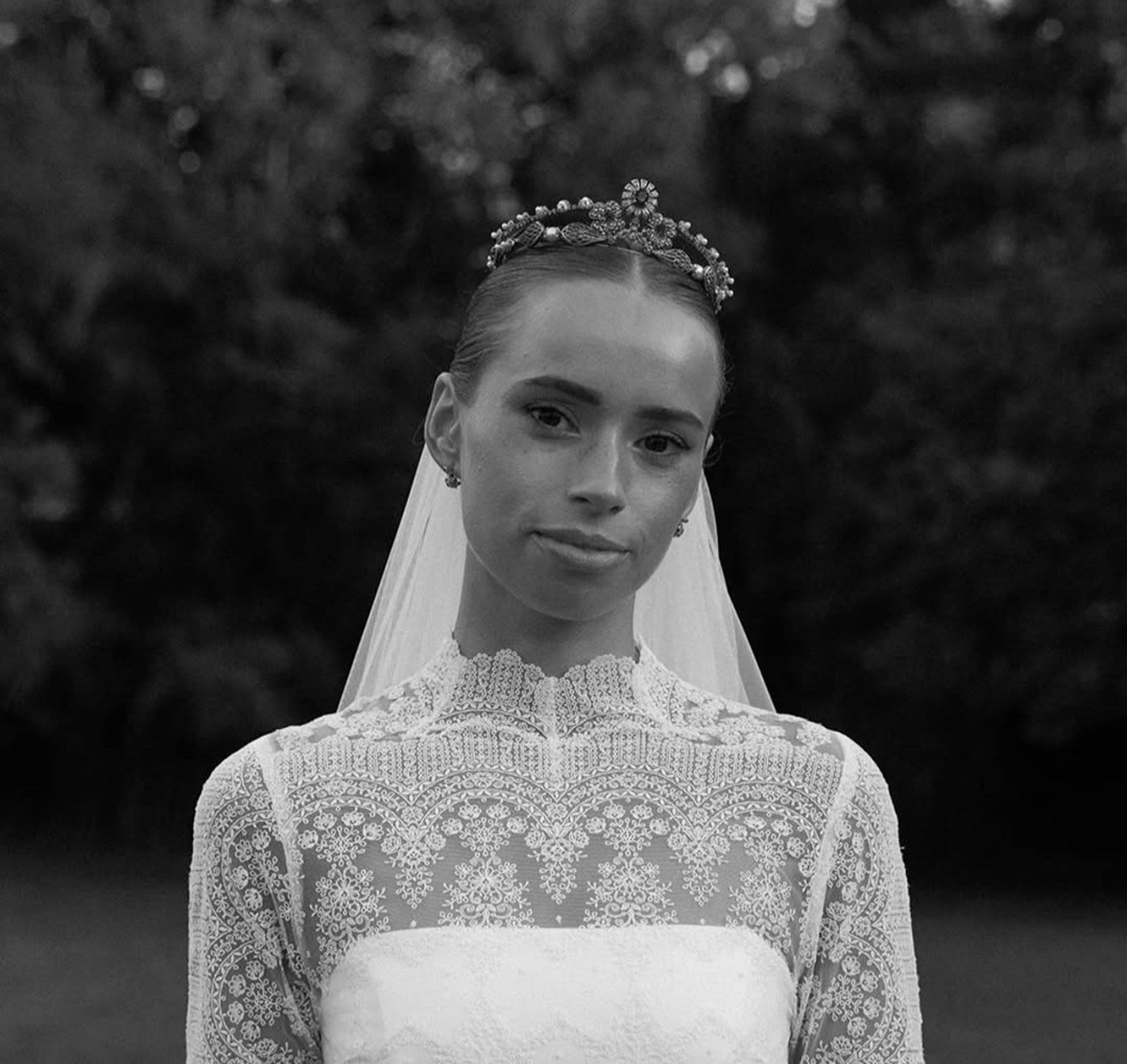 an abstract photo of a curved building with a blue sky in the background