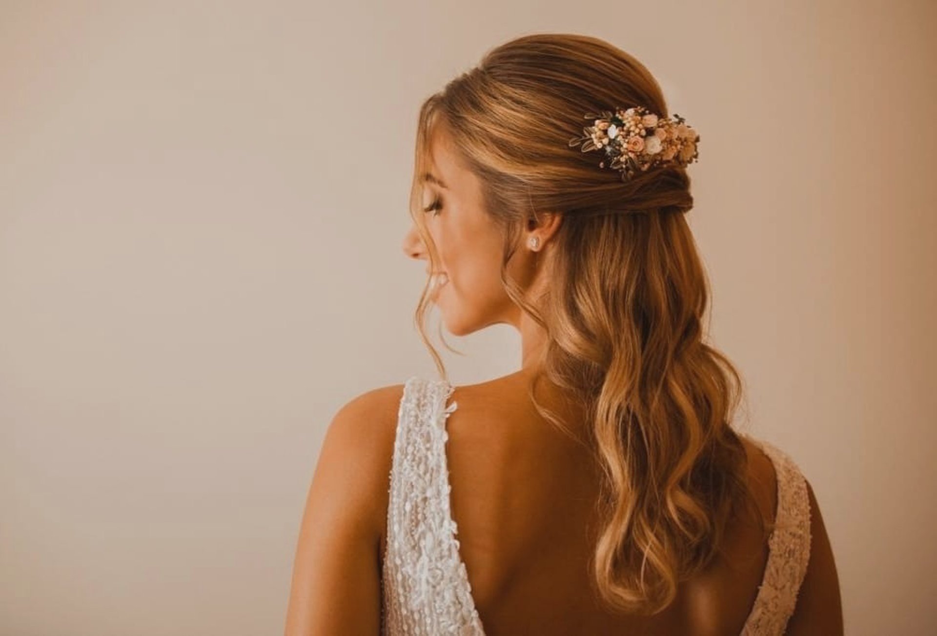 an abstract photo of a curved building with a blue sky in the background